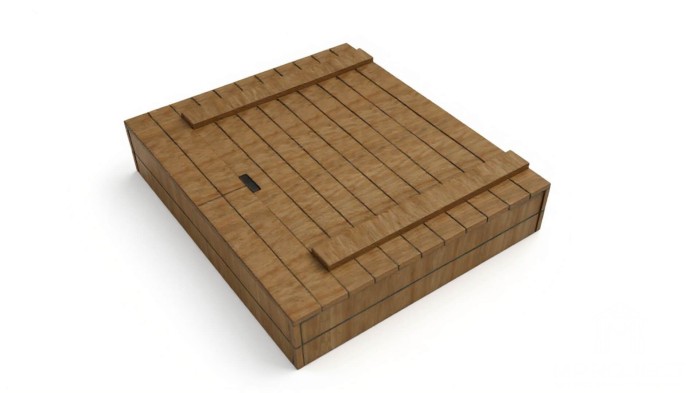 Sandkasten mit Tafel und Uhr